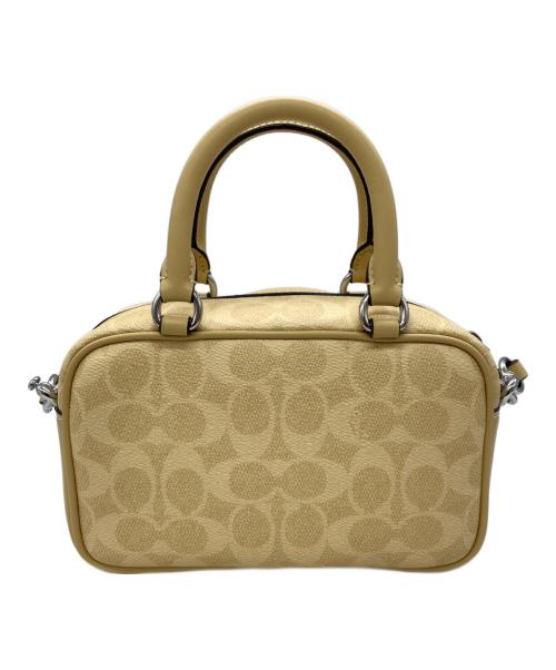 COACH（コーチ）COACH (コーチ) PEANUTS (ピーナッツ) サッチェル クロスボディ バッグ イエローの古着・服飾アイテム