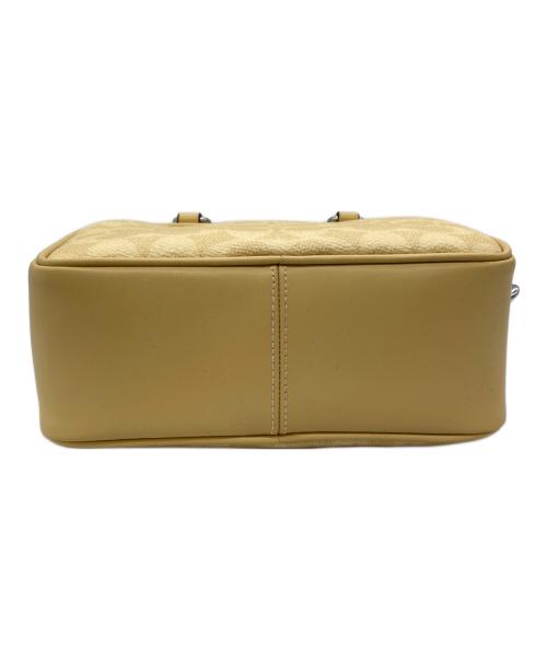 COACH（コーチ）COACH (コーチ) PEANUTS (ピーナッツ) サッチェル クロスボディ バッグ イエローの古着・服飾アイテム