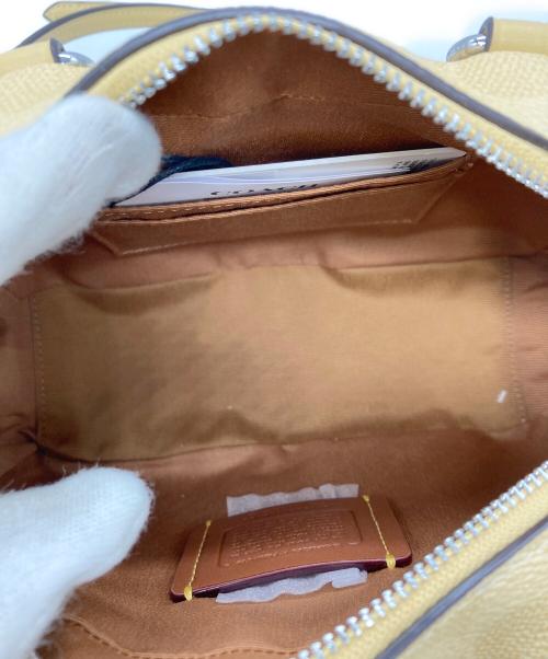 COACH（コーチ）COACH (コーチ) PEANUTS (ピーナッツ) サッチェル クロスボディ バッグ イエローの古着・服飾アイテム