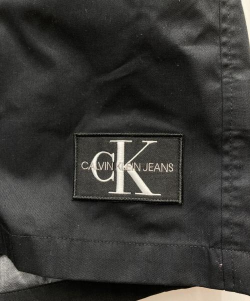 Calvin Klein Jeans（カルバンクラインジーンズ）Calvin Klein Jeans (カルバンクラインジーンズ) ステンカラーコート ブラック サイズ:Mの古着・服飾アイテム