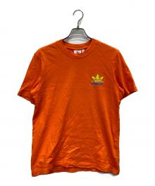 adidas Originals×PALACE（アディダスオリジナル×パレス）の古着「プリントTシャツ」｜オレンジ