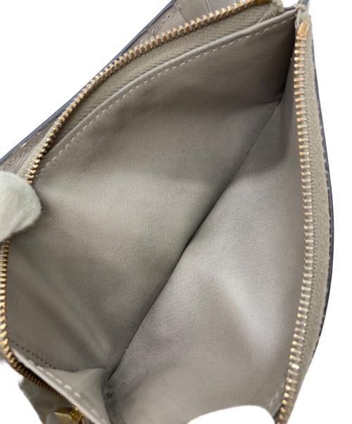 TOD'S（トッズ）TOD'S (トッズ) Tタイムレスロングウォレット グレージュの古着・服飾アイテム