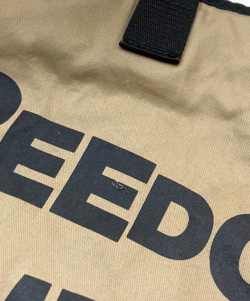 COMME des GARCONS（コムデギャルソン）COMME des GARCONS (コムデギャルソン) ロゴプリントホリデーシーズンメッセージバッグ ベージュの古着・服飾アイテム