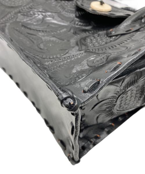 Carving Tribes（カービングトライブス）CARVING TRIBES (カービングトライブス) カーヴィングレザートートバッグ ブラックの古着・服飾アイテム