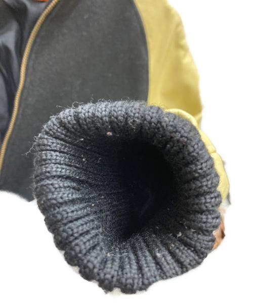 skookum（スクーカム）skookum (スクーカム) USA製 レザースリーブスタジャン ブラック×ベージュ サイズ:Lの古着・服飾アイテム