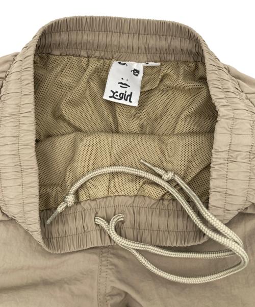 X-GIRL（エックスガール）X-GIRL (エックスガール) 3WAY TRACK PANTS（3WAY トラックパンツ） ベージュ サイズ:Mの古着・服飾アイテム