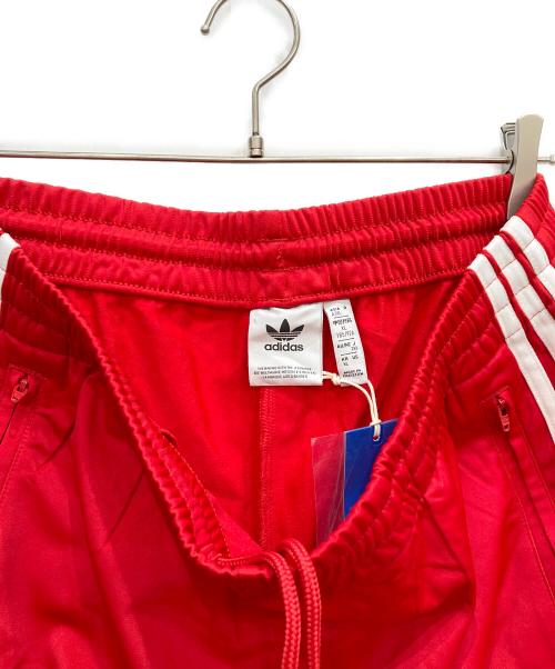 adidas Originals（アディダスオリジナル）adidas originals (アディダスオリジナル) アディカラークラシックスファイヤーバードトラックパンツ レッド サイズ:2XL 未使用品の古着・服飾アイテム