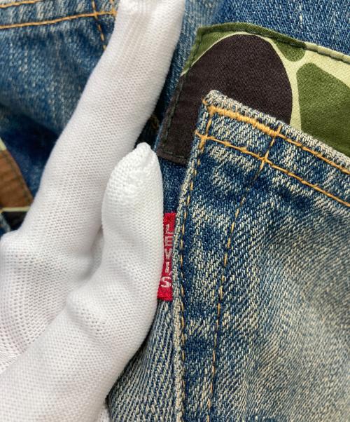 COMME des GARCONS JUNYA WATANABE MAN（コム デ ギャルソン ジュンヤ ワタナベ マン）COMME des GARCONS JUNYA WATANABE MAN (コム デ ギャルソン ジュンヤ ワタナベ マン) LEVI'S (リーバイス) デニムパンツ インディゴ サイズ:Sの古着・服飾アイテム
