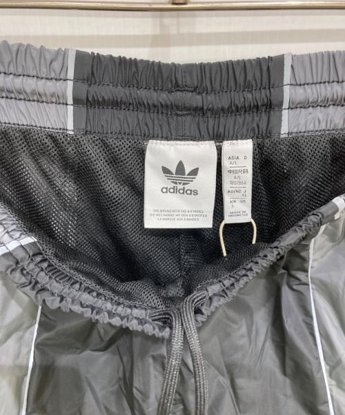 adidas Originals（アディダスオリジナル）adidas originals (アディダスオリジナル) ウーブントラックパンツ グレー サイズ:XL 未使用品の古着・服飾アイテム