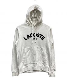 LACOSTE（ラコステ）の古着「ロゴプリントパーカー」｜ホワイト