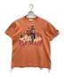 TOYS McCOY（トイズマッコイ）の古着「プリントTシャツ」｜ブラウン