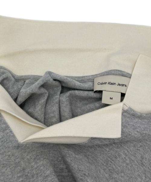 Calvin Klein Jeans（カルバンクラインジーンズ）Calvin Klein Jeans (カルバンクラインジーンズ) 長袖ポロシャツ グレー サイズ:Mの古着・服飾アイテム