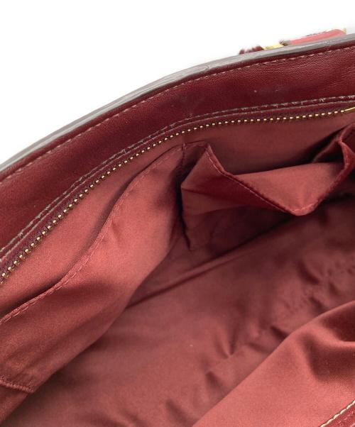 COACH（コーチ）COACH (コーチ) ハンドバッグ レッドの古着・服飾アイテム