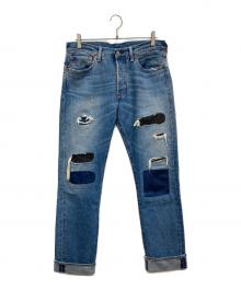 LEVI'S（リーバイス）の古着「リペア加工デニムパンツ」｜インディゴ