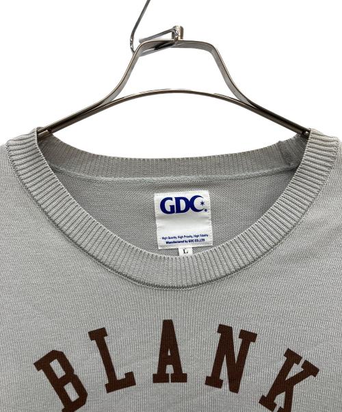 GDC（ジーディーシー）GDC (ジーディーシー) プリントニット グレー サイズ:Lの古着・服飾アイテム