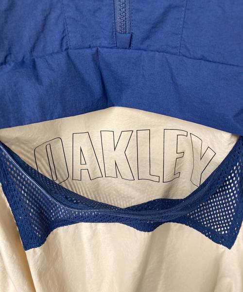 OAKLEY（オークリー）OAKLEY (オークリー) アノラックパーカー ブルー×ベージュ サイズ:Mの古着・服飾アイテム