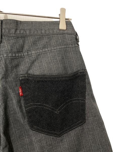 COMME des GARCONS JUNYA WATANABE MAN（コム デ ギャルソン ジュンヤ ワタナベ マン）COMME des GARCONS JUNYA WATANABE MAN (コム デ ギャルソン ジュンヤ ワタナベ マン) LEVI'S (リーバイス) ストライプデニムパンツ WL-P205 AD2013 ブラック サイズ:XSの古着・服飾アイテム