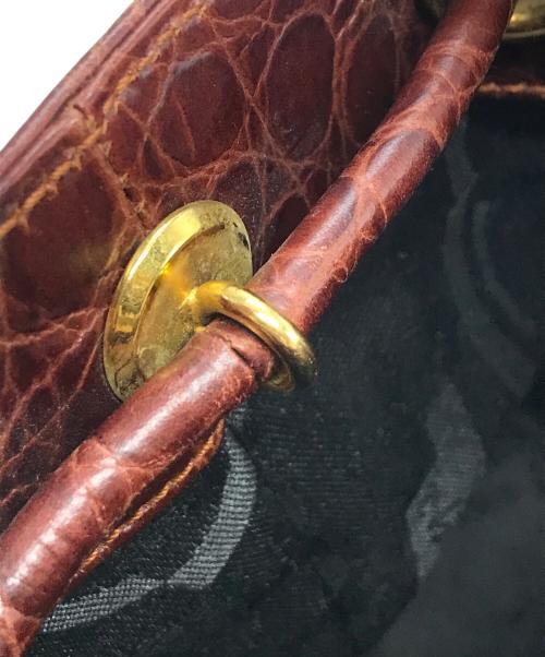 Salvatore Ferragamo（サルヴァトーレ フェラガモ）Salvatore Ferragamo (サルヴァトーレ フェラガモ) 型押し巾着ミニバックパック BZ-21・5676 ボルドー×ブラウンの古着・服飾アイテム