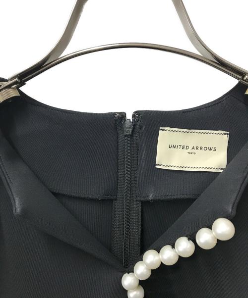 UNITED ARROWS（ユナイテッドアローズ）UNITED ARROWS (ユナイテッドアローズ) SPONGY パールモチーフ ブラウス ブラック サイズ:FREEの古着・服飾アイテム