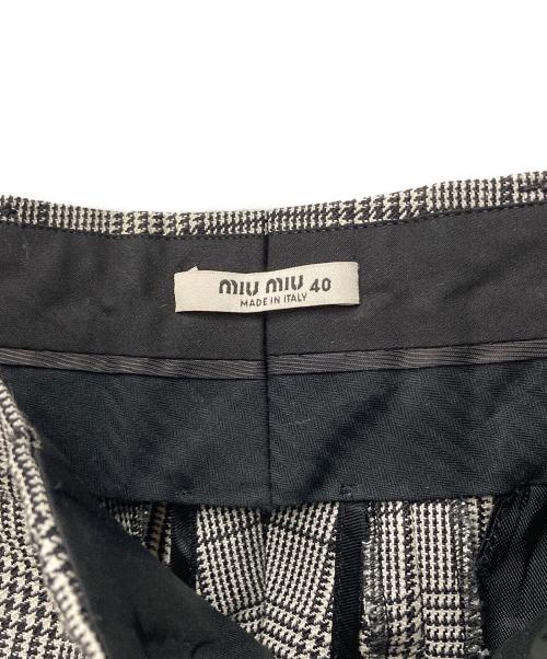 MIU MIU（ミュウミュウ）MIU MIU (ミュウミュウ) グレンチェック テーパードパンツ MP778 R161 087 グレー×ブラック サイズ:40の古着・服飾アイテム
