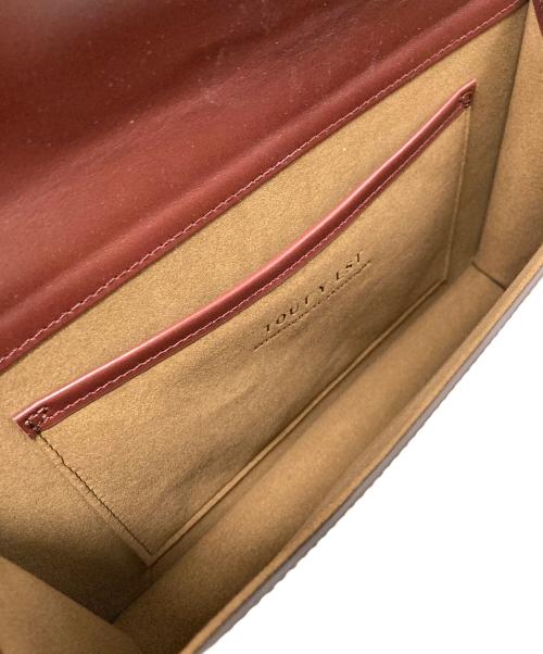 TOUT Y EST（トゥティエ）TOUT Y EST (トゥティエ) ポメルバッグ ボルドーの古着・服飾アイテム