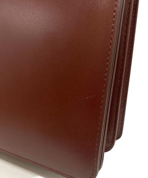 TOUT Y EST（トゥティエ）TOUT Y EST (トゥティエ) ポメルバッグ ボルドーの古着・服飾アイテム