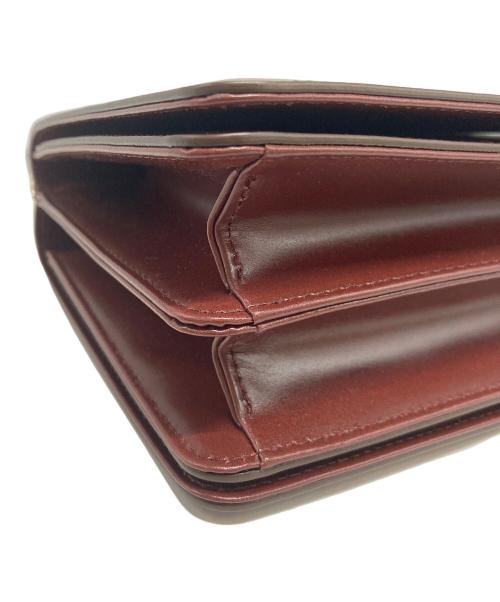 TOUT Y EST（トゥティエ）TOUT Y EST (トゥティエ) ポメルバッグ ボルドーの古着・服飾アイテム