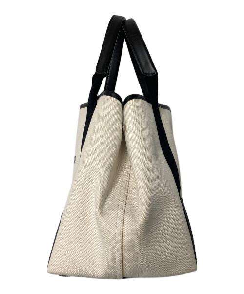 BALENCIAGA（バレンシアガ）BALENCIAGA (バレンシアガ) カバス キャンバストート アイボリー×ブラックの古着・服飾アイテム