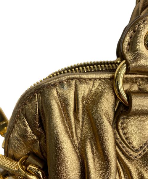 MIU MIU（ミュウミュウ）MIU MIU (ミュウミュウ) マテラッセ 2WAYバッグ London 2012 Special Edition 15/18 ゴールドの古着・服飾アイテム