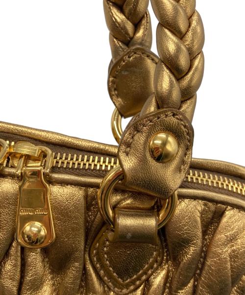 MIU MIU（ミュウミュウ）MIU MIU (ミュウミュウ) マテラッセ 2WAYバッグ London 2012 Special Edition 15/18 ゴールドの古着・服飾アイテム