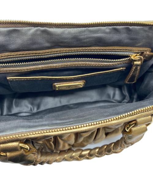 MIU MIU（ミュウミュウ）MIU MIU (ミュウミュウ) マテラッセ 2WAYバッグ London 2012 Special Edition 15/18 ゴールドの古着・服飾アイテム