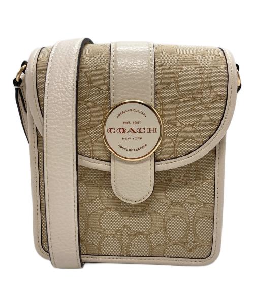 COACH（コーチ）COACH (コーチ) ノース／サウス ロニー クロスボディ シグネチャー ジャカード ベージュ×アイボリーの古着・服飾アイテム