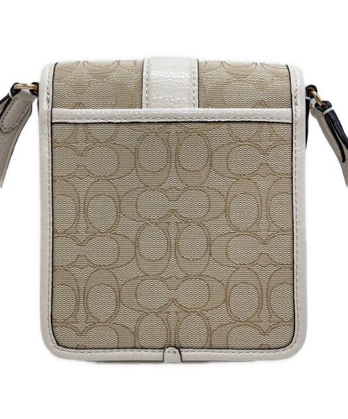 COACH（コーチ）COACH (コーチ) ノース／サウス ロニー クロスボディ シグネチャー ジャカード ベージュ×アイボリーの古着・服飾アイテム
