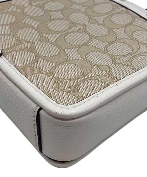 COACH（コーチ）COACH (コーチ) ノース／サウス ロニー クロスボディ シグネチャー ジャカード ベージュ×アイボリーの古着・服飾アイテム