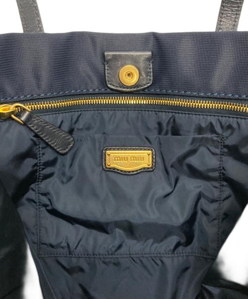 MIU MIU（ミュウミュウ）MIU MIU (ミュウミュウ) ロゴ トートバッグ ネイビーの古着・服飾アイテム