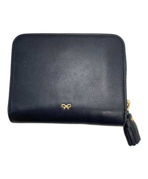 ANYA HINDMARCH（アニヤ・ハインドマーチ）ANYA HINDMARCH (アニヤハインドマーチ) ツイストリボンデザイン二つ折り財布 ブラックの古着・服飾アイテム