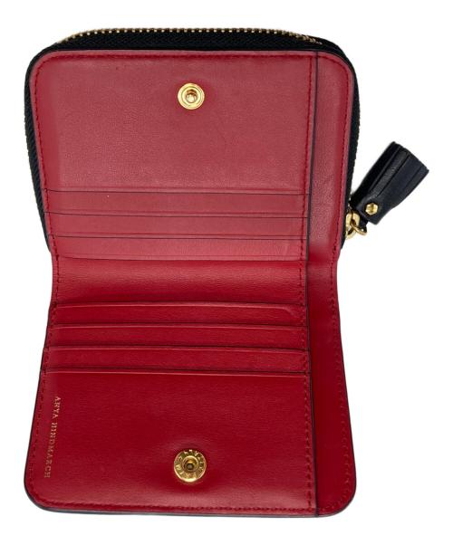 ANYA HINDMARCH（アニヤ・ハインドマーチ）ANYA HINDMARCH (アニヤハインドマーチ) ツイストリボンデザイン二つ折り財布 ブラックの古着・服飾アイテム