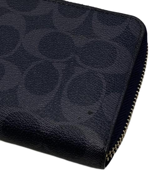 COACH（コーチ）COACH (コーチ) シグネチャーラウンドファスナー財布 ネイビーの古着・服飾アイテム