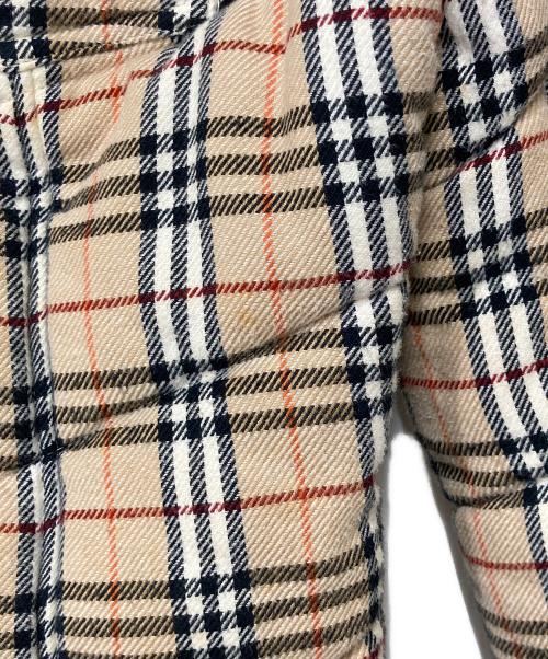 BURBERRY BLUE LABEL（バーバリーロンドンブルーレーベル）BURBERRY BLUE LABEL (バーバリーロンドンブルーレーベル) リバーシブルパテッドジャケット ベージュ×ブラック サイズ:40の古着・服飾アイテム