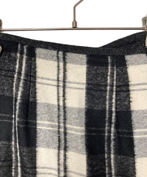 O'NEIL OF DUBLIN（オニールオブダブリン）O'NEIL OF DUBLIN (オニールオブダブリン) チェック切替ウール混プリーツスカート ブラック×ホワイト サイズ:36の古着・服飾アイテム