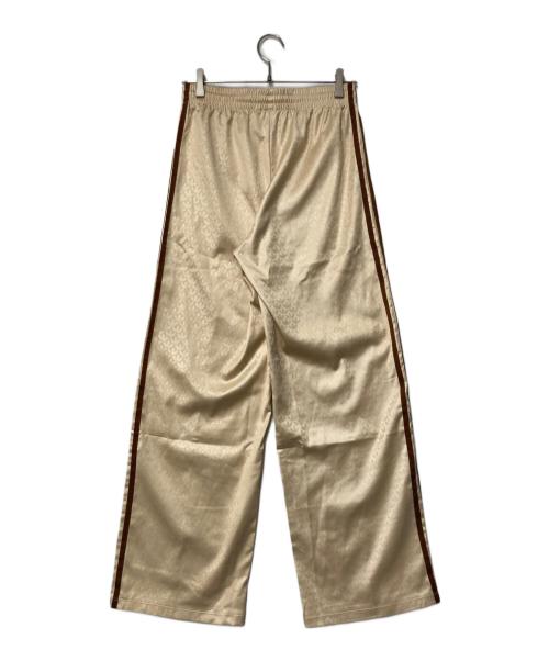 adidas（アディダス）adidas (アディダス) モノグラムサテントラックパンツ ベージュ×ブラウン サイズ:Mの古着・服飾アイテム