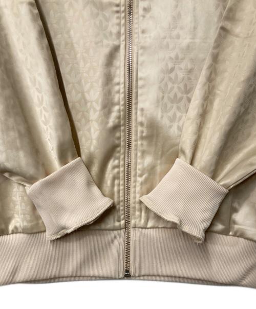 adidas（アディダス）adidas (アディダス) モノグラム サテン ファイヤーバード トラックジャケット ベージュ×ブラウン サイズ:Ｍの古着・服飾アイテム