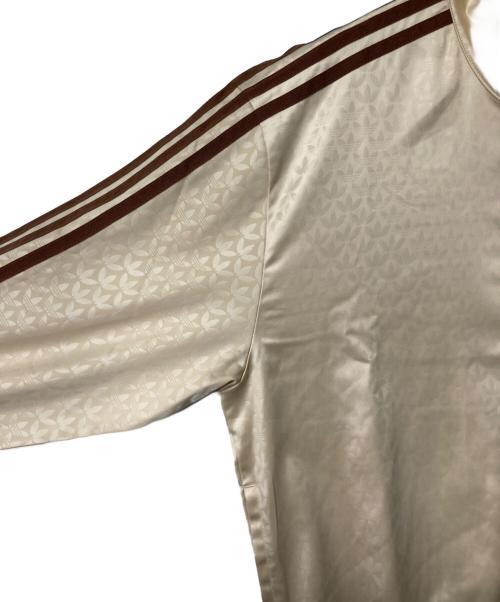 adidas（アディダス）adidas (アディダス) モノグラム サテン ファイヤーバード トラックジャケット ベージュ×ブラウン サイズ:Ｍの古着・服飾アイテム