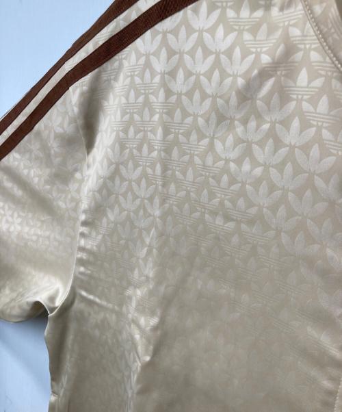 adidas（アディダス）adidas (アディダス) モノグラム サテン ファイヤーバード トラックジャケット ベージュ×ブラウン サイズ:Ｍの古着・服飾アイテム