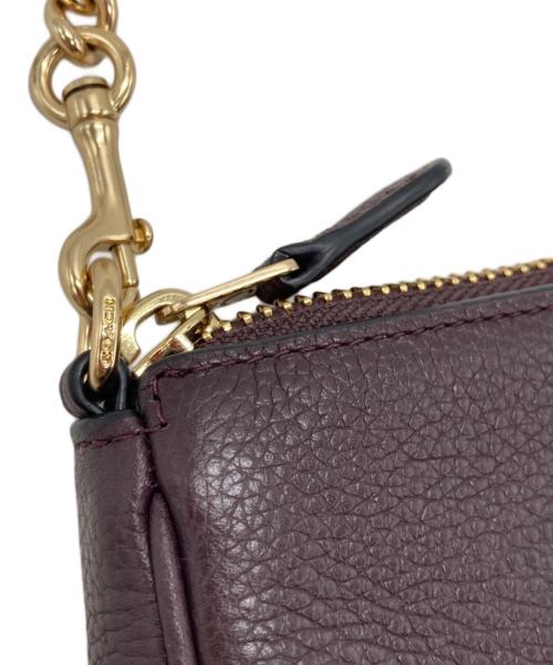 COACH（コーチ）COACH (コーチ) チェーン ハンドポーチ ブラウンの古着・服飾アイテム