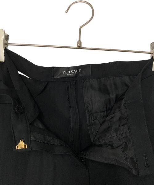 VERSACE（ヴェルサーチェ）VERSACE (ヴェルサーチェ) Embellished Cutout Jersey Flared Pants ブラック サイズ:36の古着・服飾アイテム