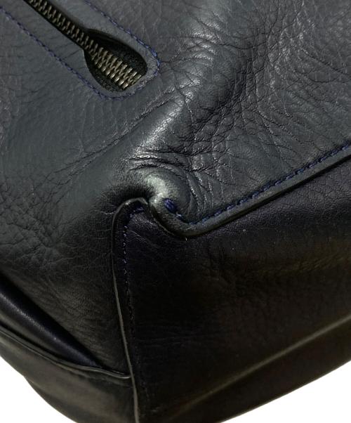 COACH（コーチ）COACH (コーチ) マンハッタン レザーバックパック ネイビー×ブラックの古着・服飾アイテム