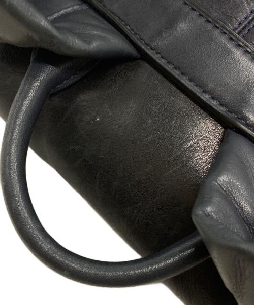 COACH（コーチ）COACH (コーチ) マンハッタン レザーバックパック ネイビー×ブラックの古着・服飾アイテム