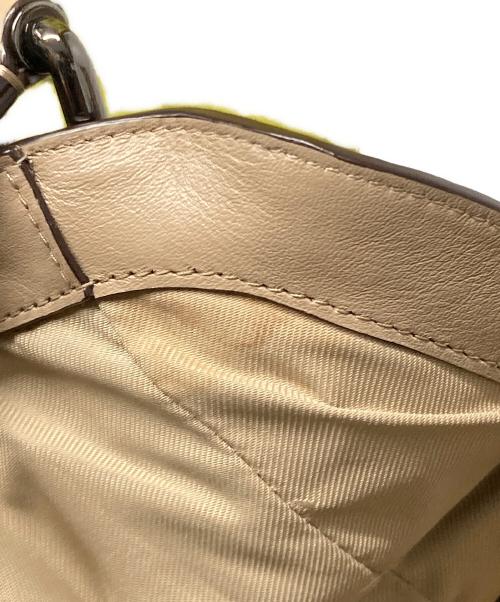 COACH（コーチ）COACH (コーチ) イーディー スエード切替トートバッグ ベージュの古着・服飾アイテム