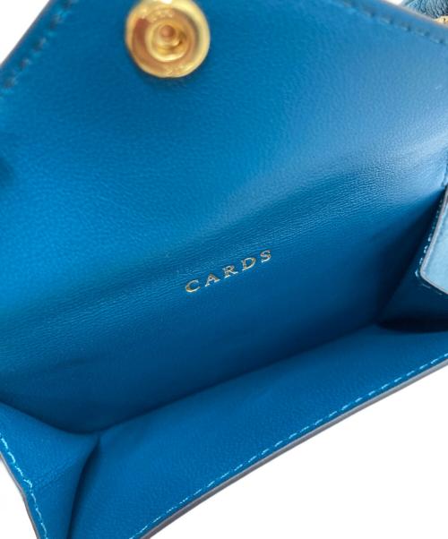 ANYA HINDMARCH（アニヤ・ハインドマーチ）ANYA HINDMARCH (アニヤ・ハインドマーチ) KELLOGGS (ケロッグ) KELLOGGS トニーザタイガー ジップフォンポーチ ターコイズの古着・服飾アイテム